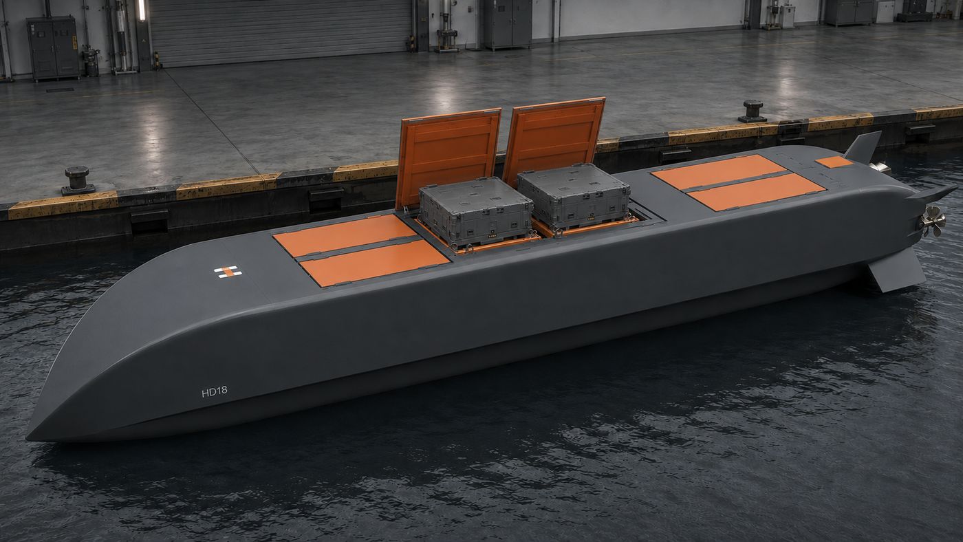 Alongside in the shed with a hatch pair open and two modules seated